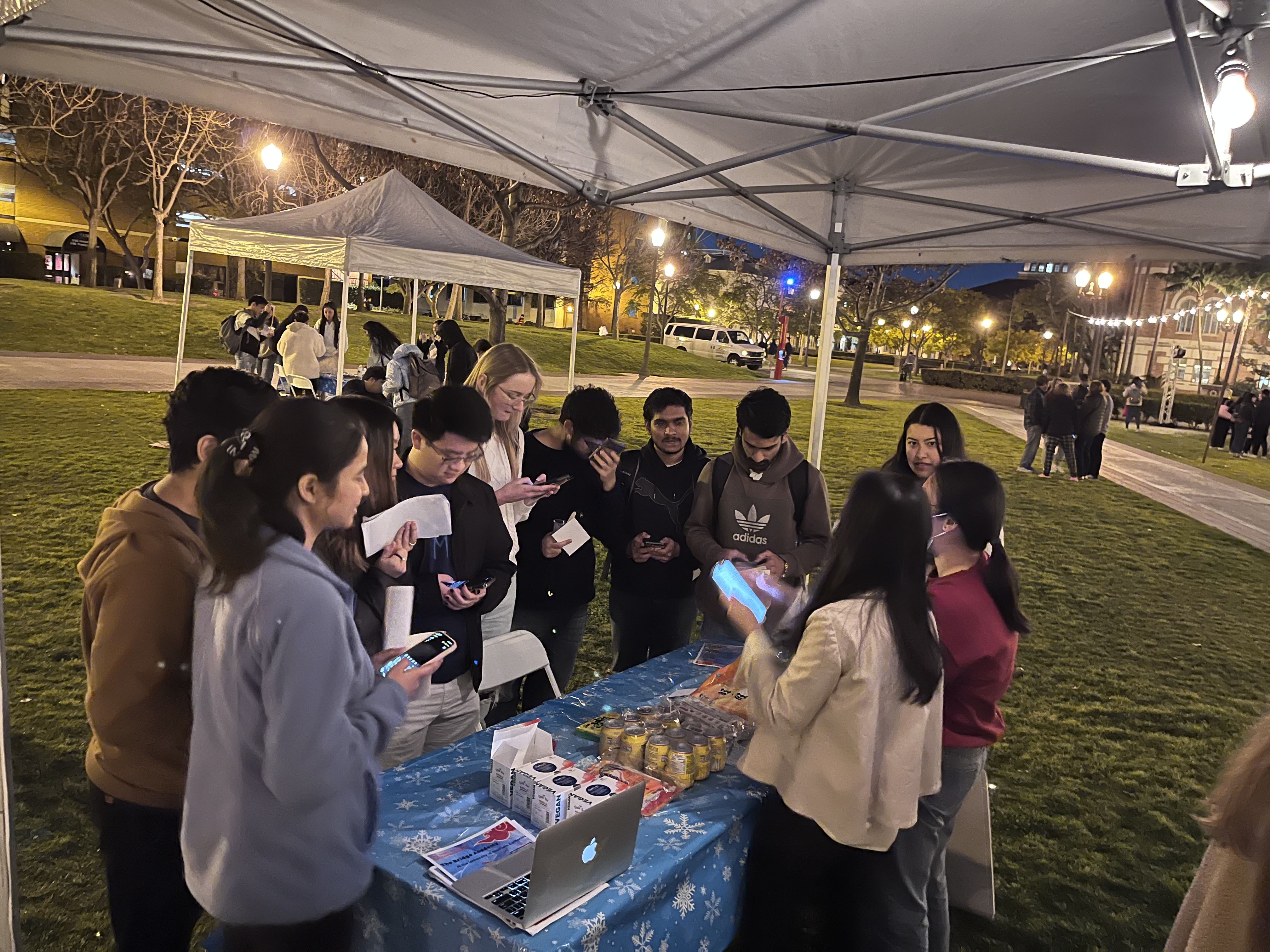 Students gather around the BCEA booth at USC