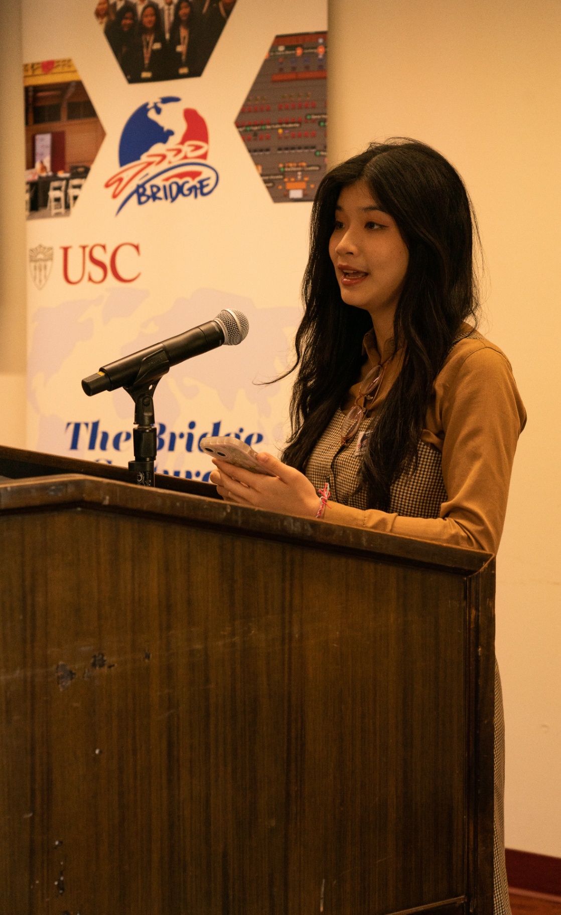 BCEA delegate speaking at the podium during the summit